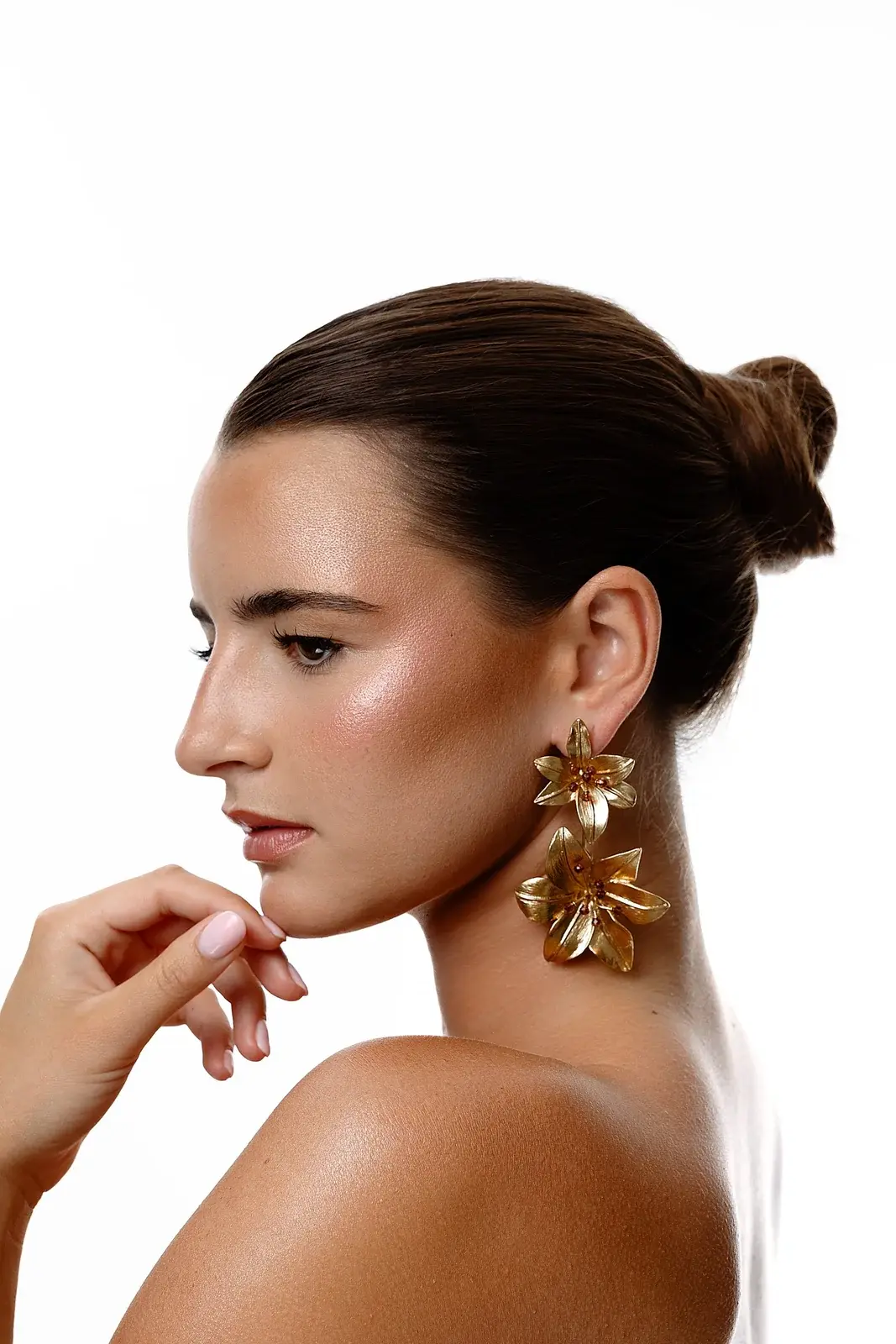 Editorial profile beauty look with statement gold earrings by Mihaela Taban